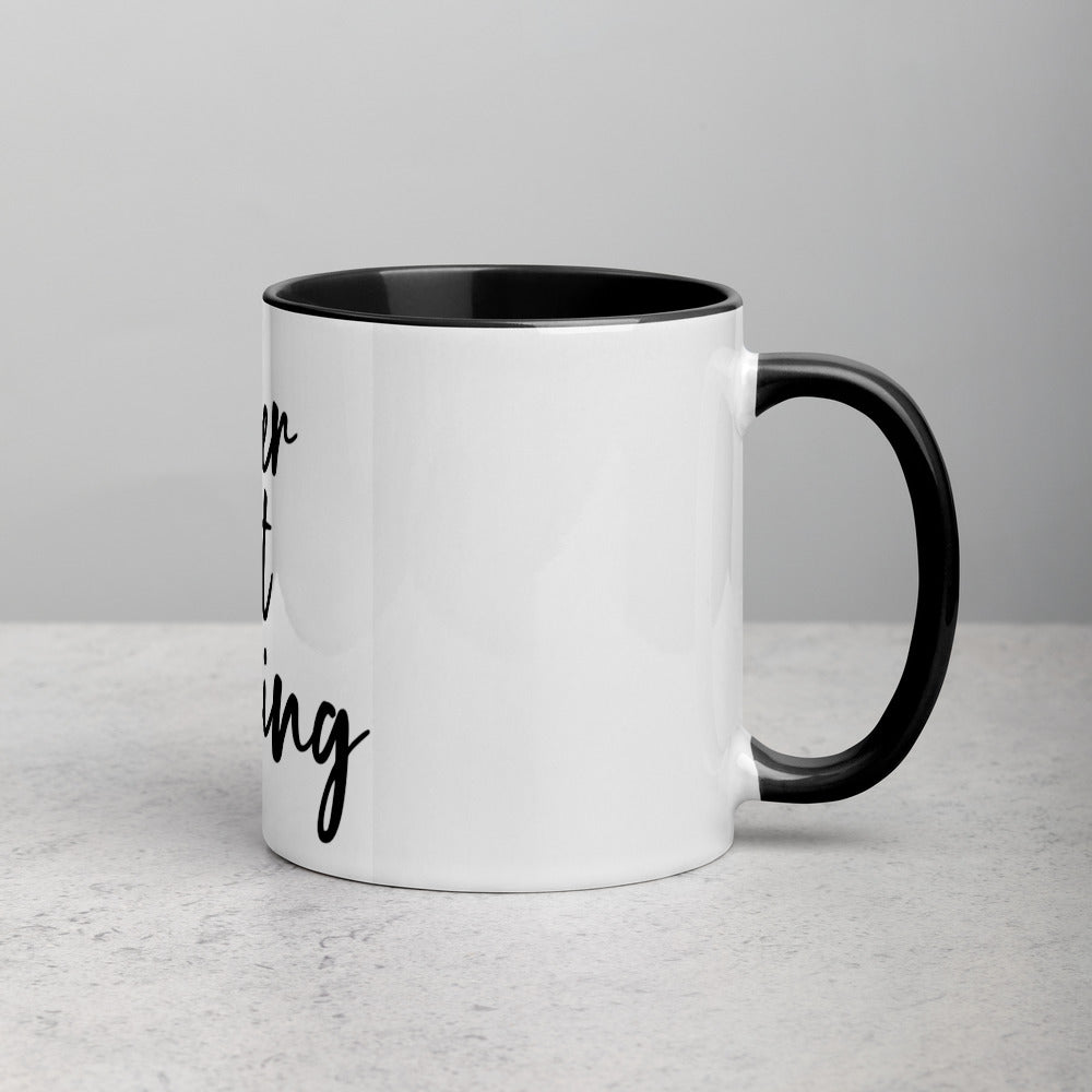 never not working - black mug with color inside